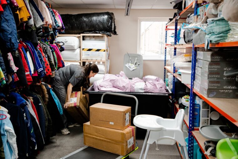 CH11494801_Volunteers-organising-items-to-be-donated-in-Sebbys-Corner-Baby-Bank-1.jpg